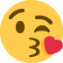Face throwing a kiss